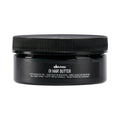 Davines OI Hair Butter jar with black ribbed lid, front label text