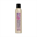 Davines dry texturizing finishing spray bottle, beige bottle with black cap