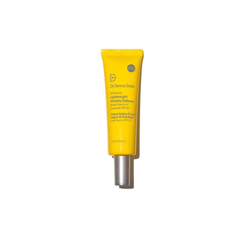 Dr. Dennis Gross sunscreen squeeze tube, yellow with silver cap