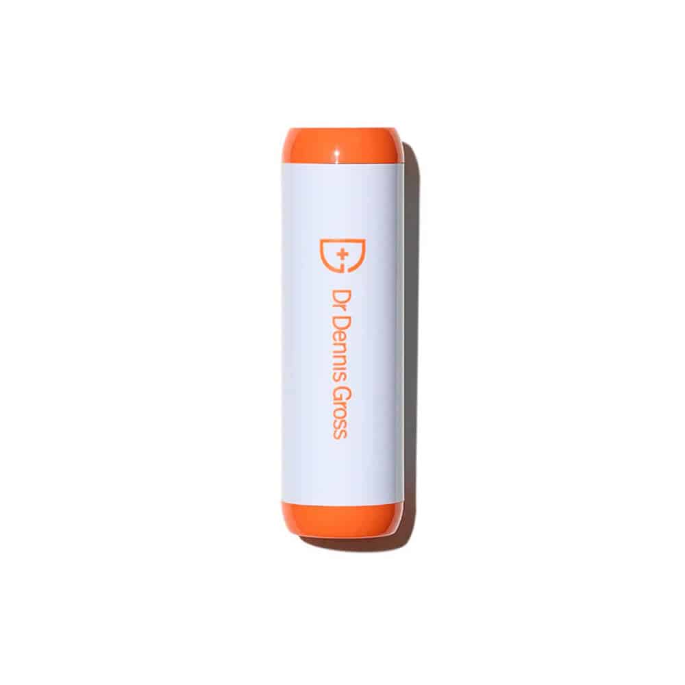 Acne treatment device, white cylinder with orange ends and DRx logo