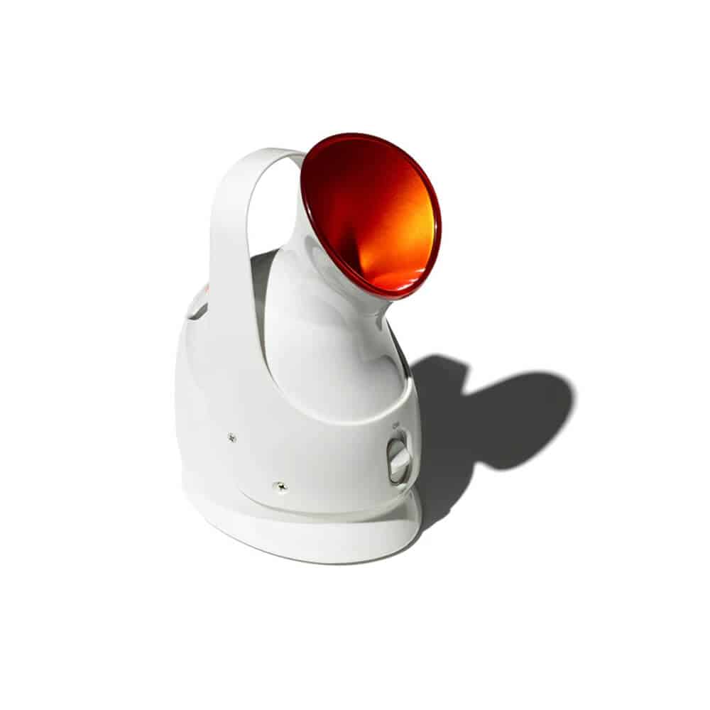 White facial steamer with round amber nozzle and control button