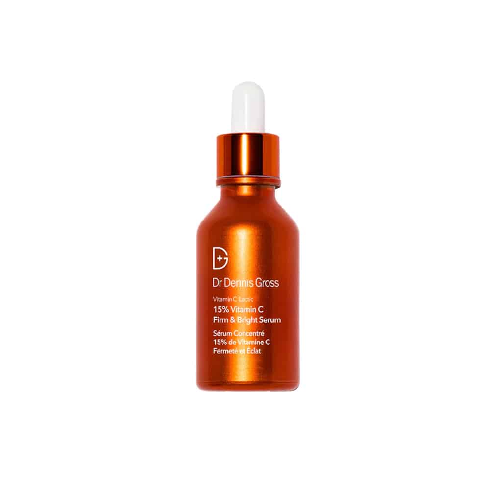 Dr. Dennis Gross Vitamin C serum bottle with white dropper cap, amber glass