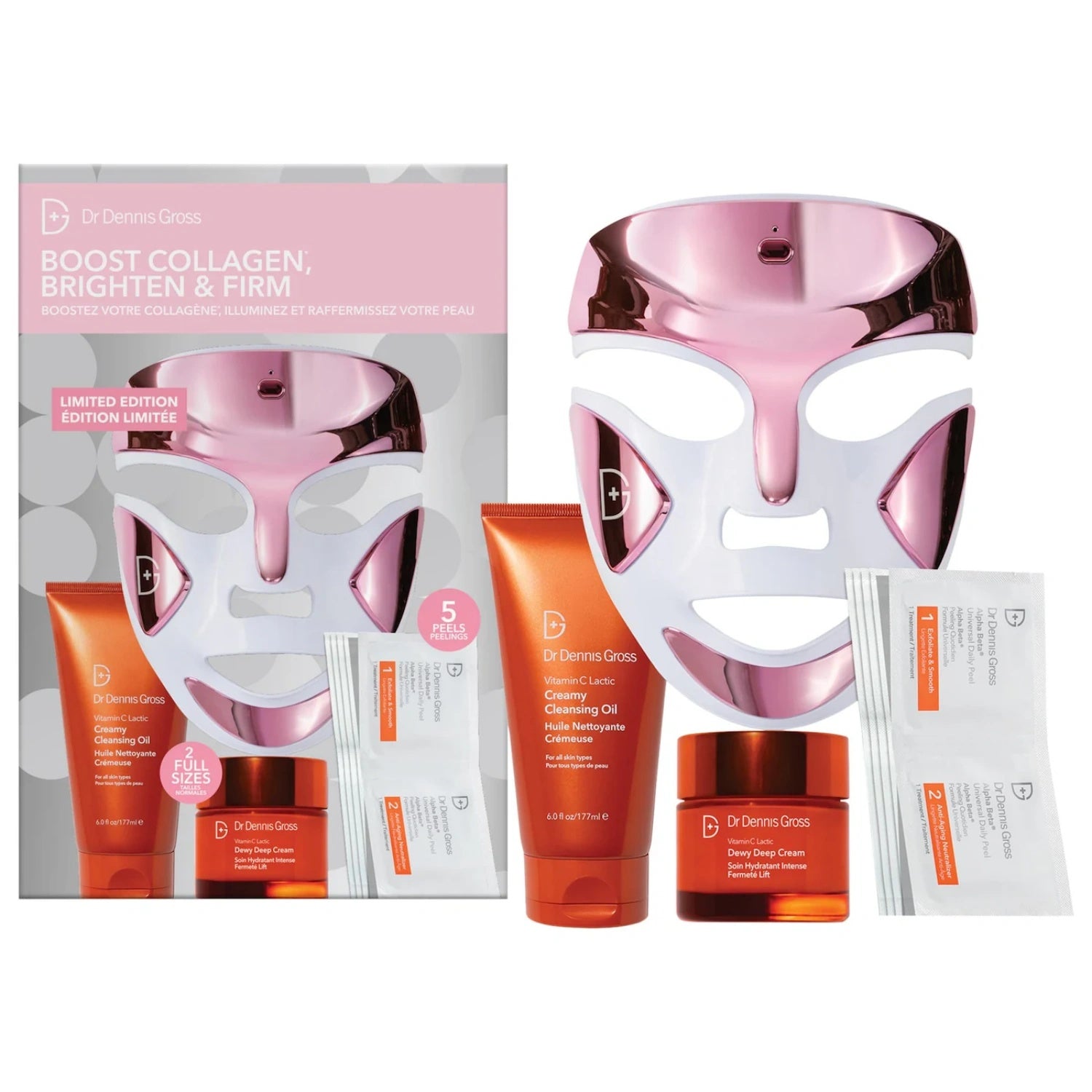 Rose gold LED face mask set with orange serum bottles and white skincare packets