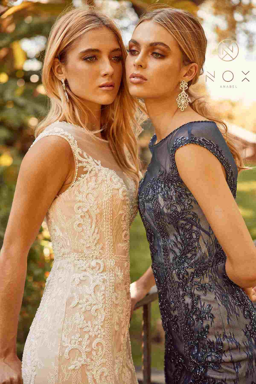 Fitted lace sheath formal dress with illusion neckline, sleeveless, navy blue lace