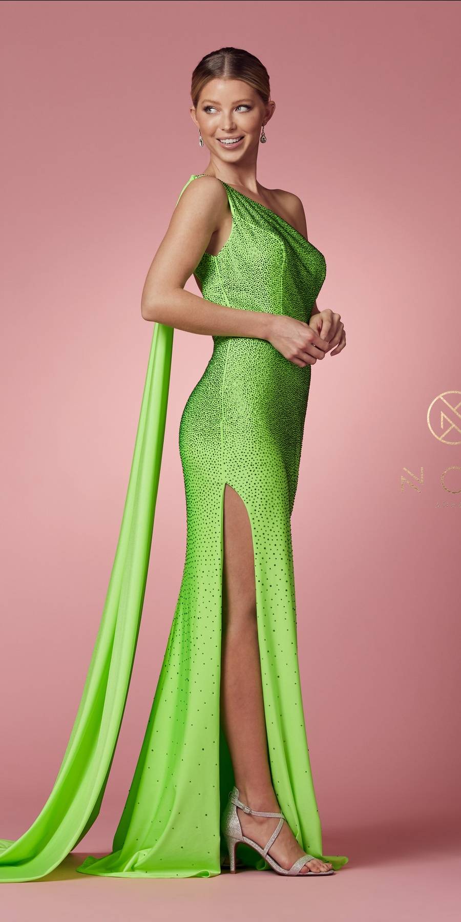 Apple green one-shoulder gown with long sash drape, fitted bodice and thigh-high slit.