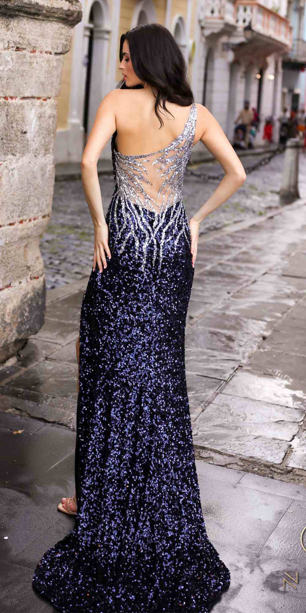 Navy blue sequin gown with open illusion back and high side slit