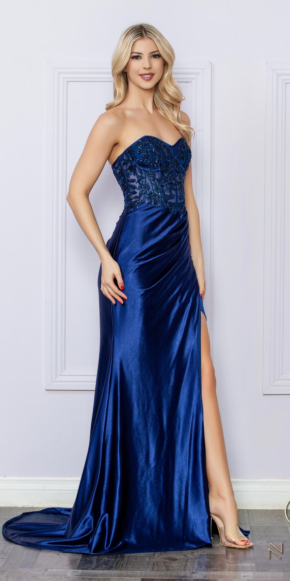 Dark blue strapless formal gown with embellished bodice and front slit