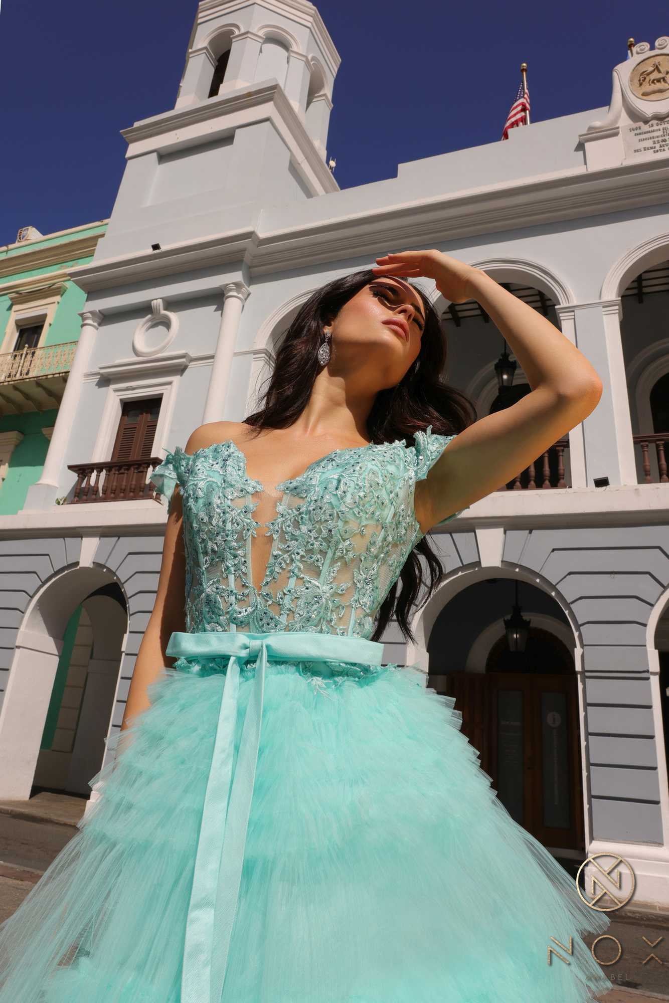 Long off-shoulder sweetheart tulle gown in mint with embellished bodice and tiered skirt