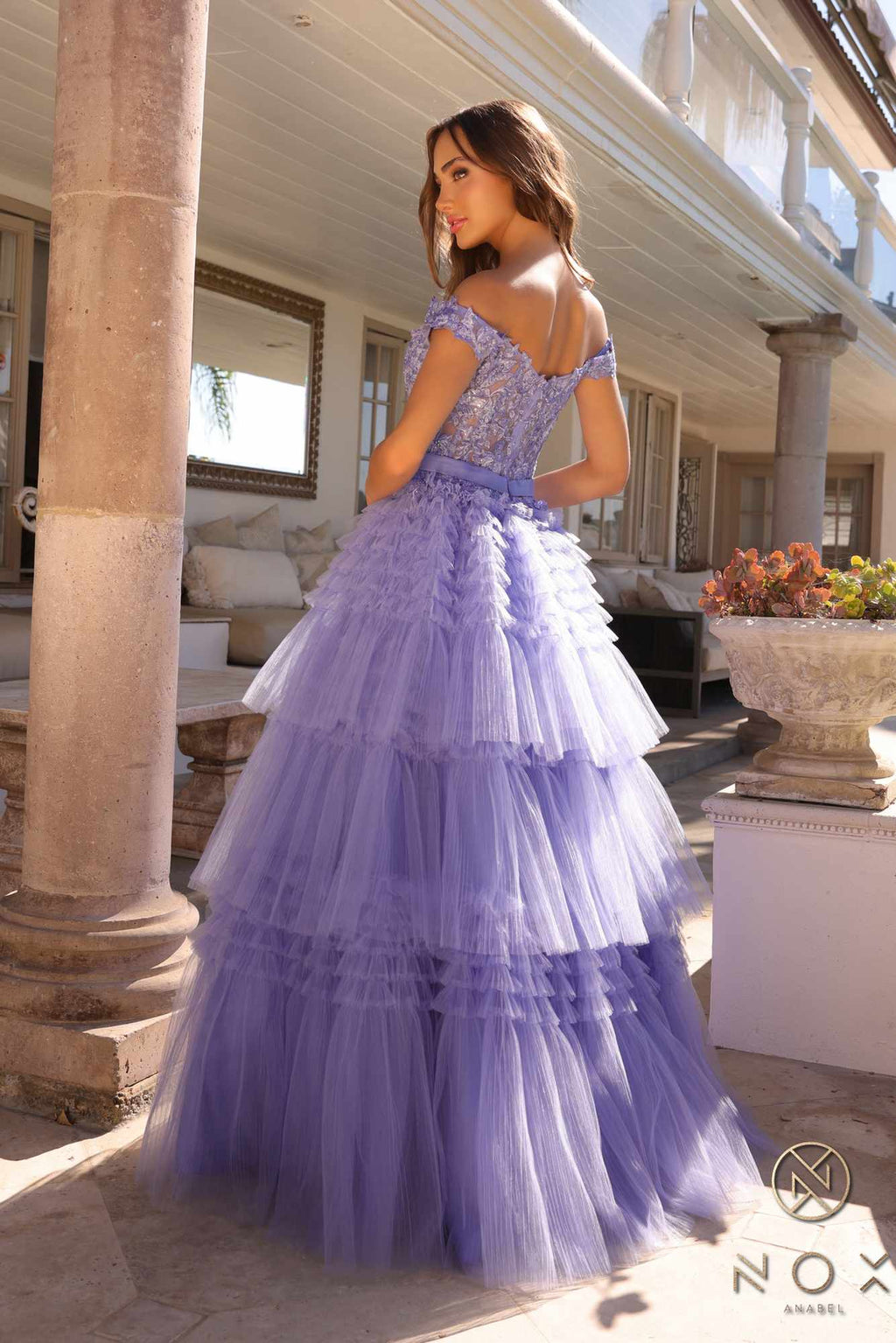 Long off-shoulder sweetheart tulle gown in periwinkle with layered ruffle tiers