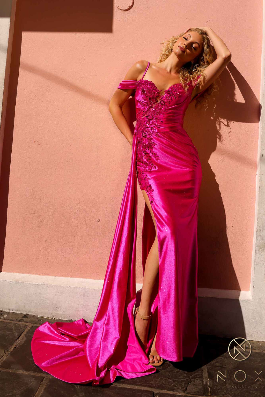 Fuchsia satin off-shoulder gown with embroidered bodice, fitted waist, and high slit