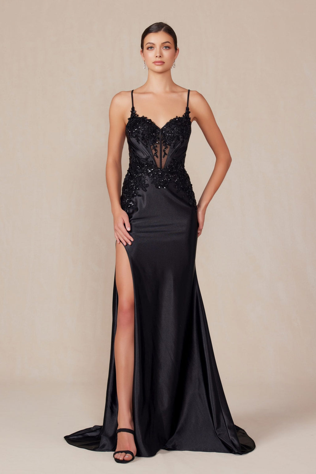 Black satin evening dress with sweetheart neckline, beaded bodice, side slit