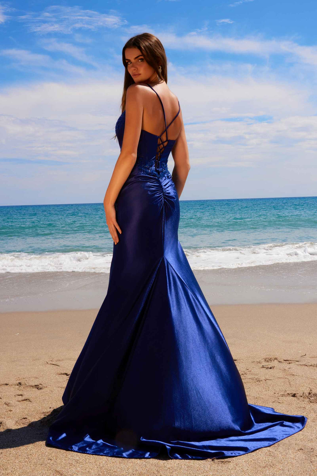Navy satin evening dress with spaghetti straps, sweetheart bodice, and side slit