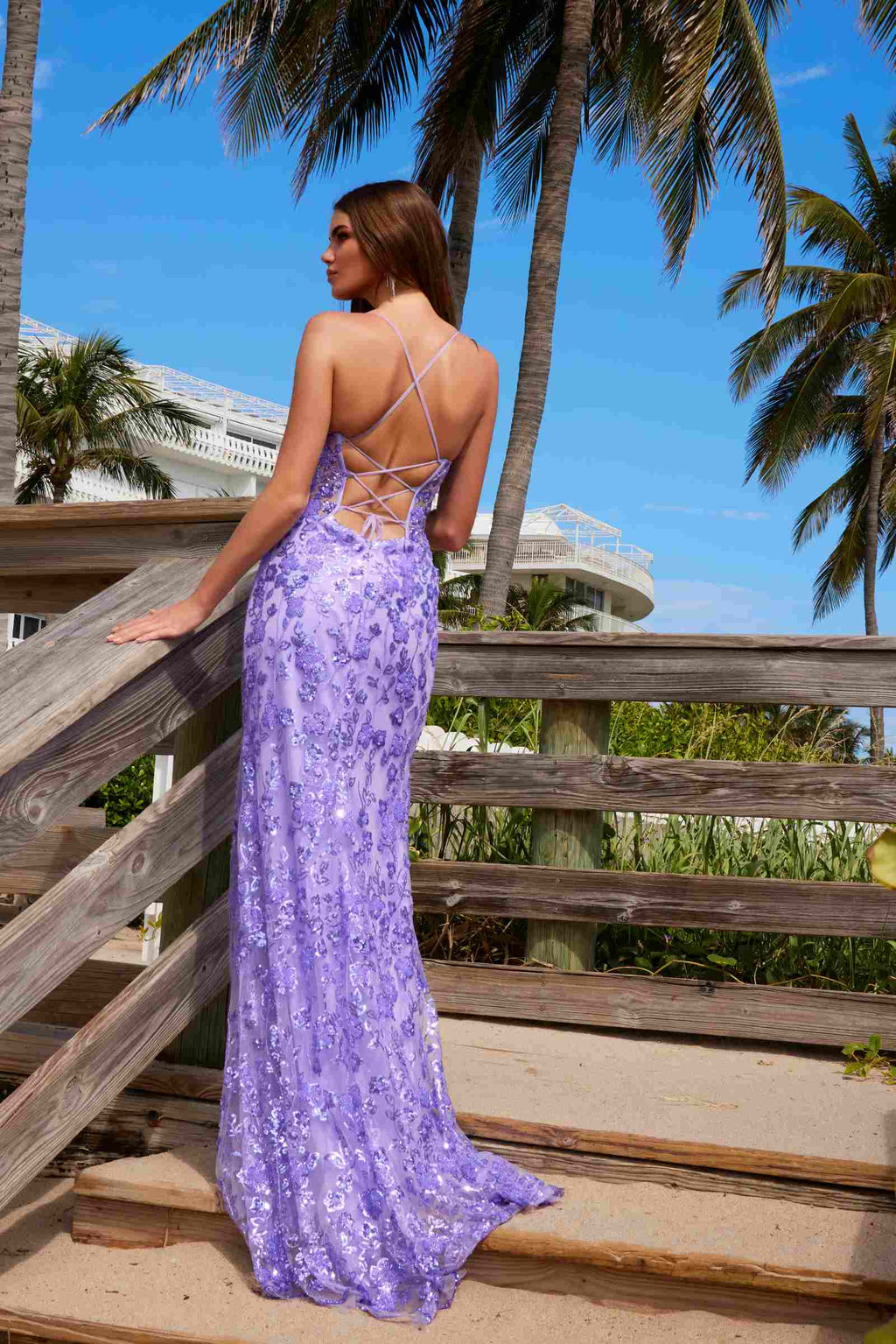 Purple long beaded sequin dress with floral pattern, open low back and thin straps