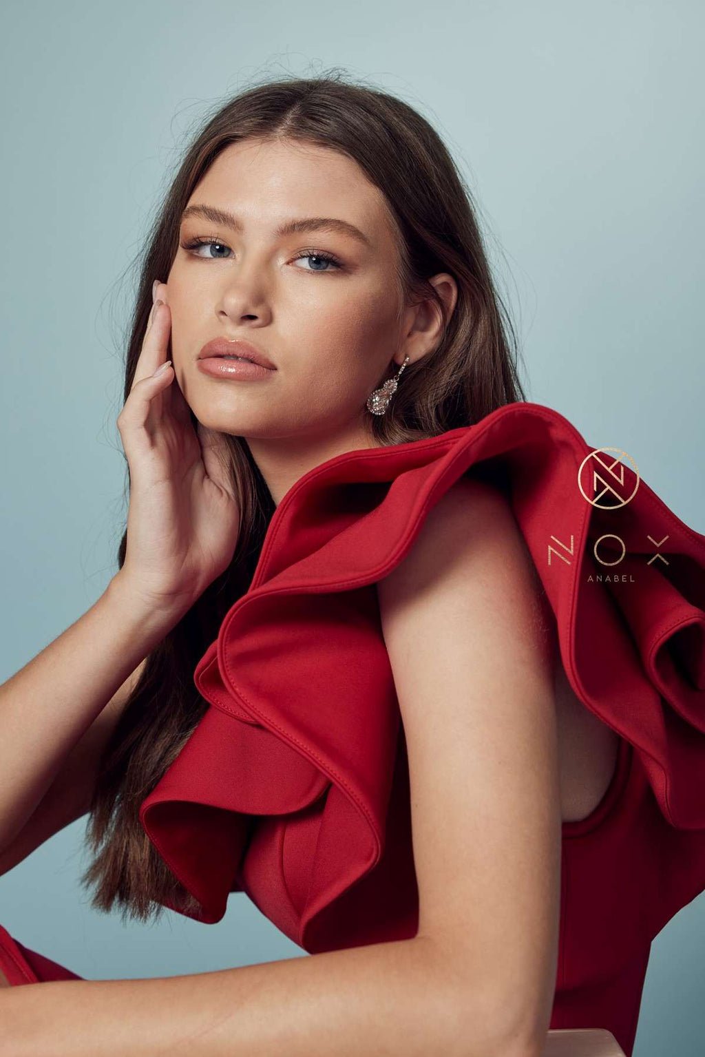 Red one-shoulder ruffle overlay sheath gown with ruffled neckline and exposed shoulder