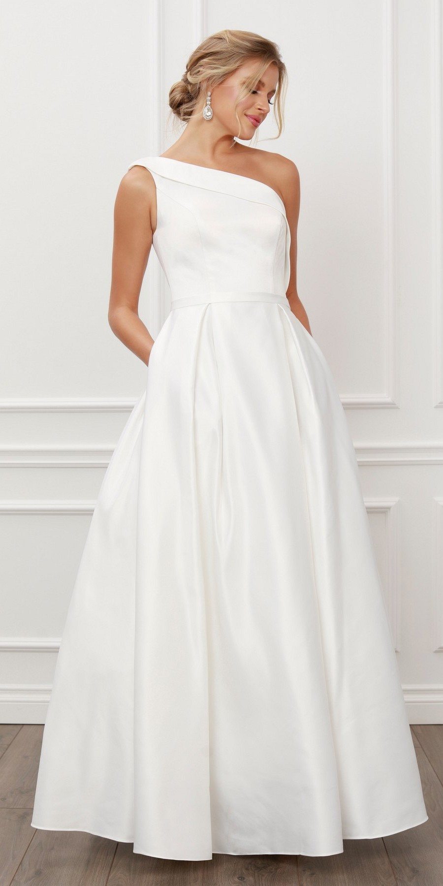 White one-shoulder satin A-line long dress, back 3/4 view with structured waist