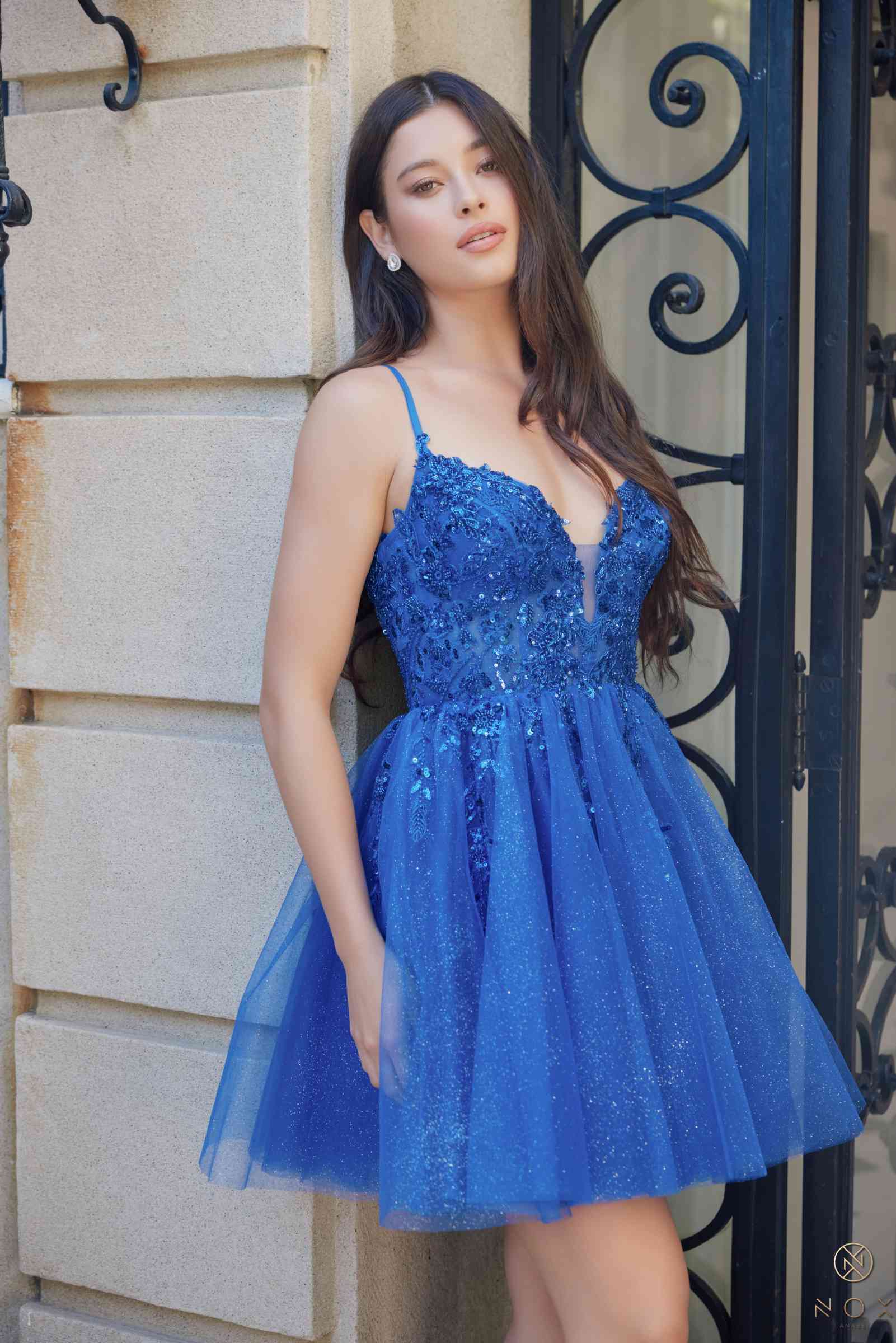 Royal blue sleeveless A-line dress with V-neck glitter applique and gathered tulle skirt