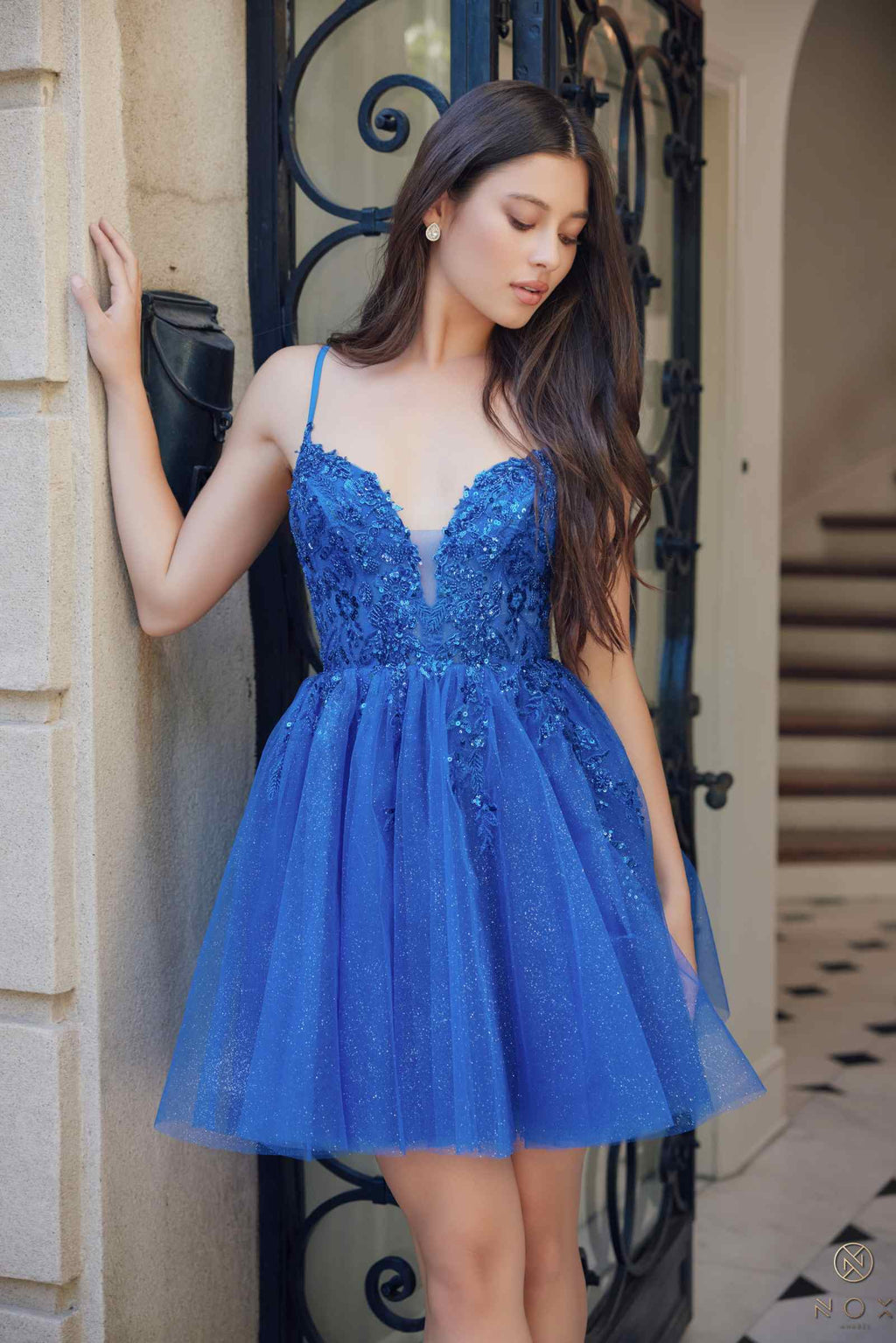 Royal blue sleeveless A-line dress with V-neck glitter applique and gathered tulle skirt