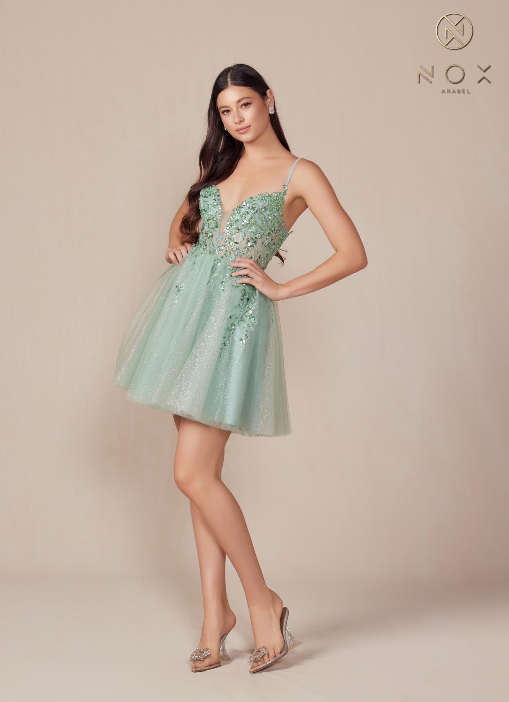 Sage green sleeveless A-line dress with V-neck beaded applique and short tulle skirt