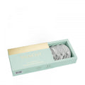 Valmont eye mask pack of 5 in mint green box with five foil-sealed masks