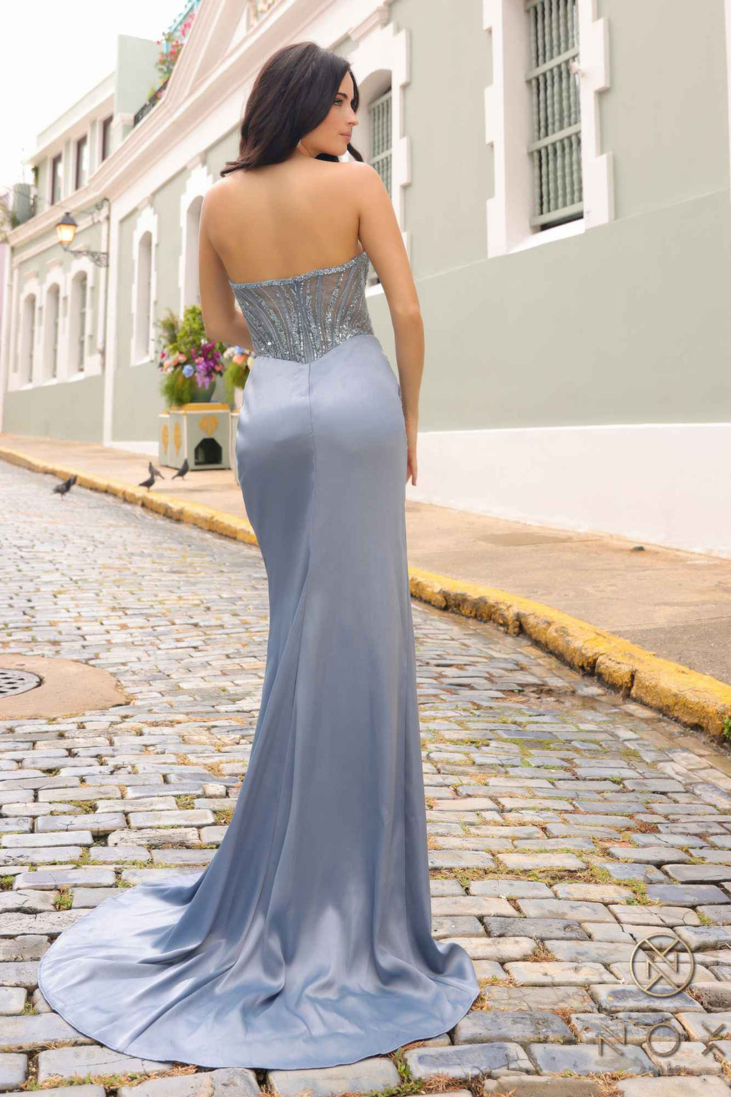 Back view strapless beaded sequin satin gown in smoky blue with long skirt