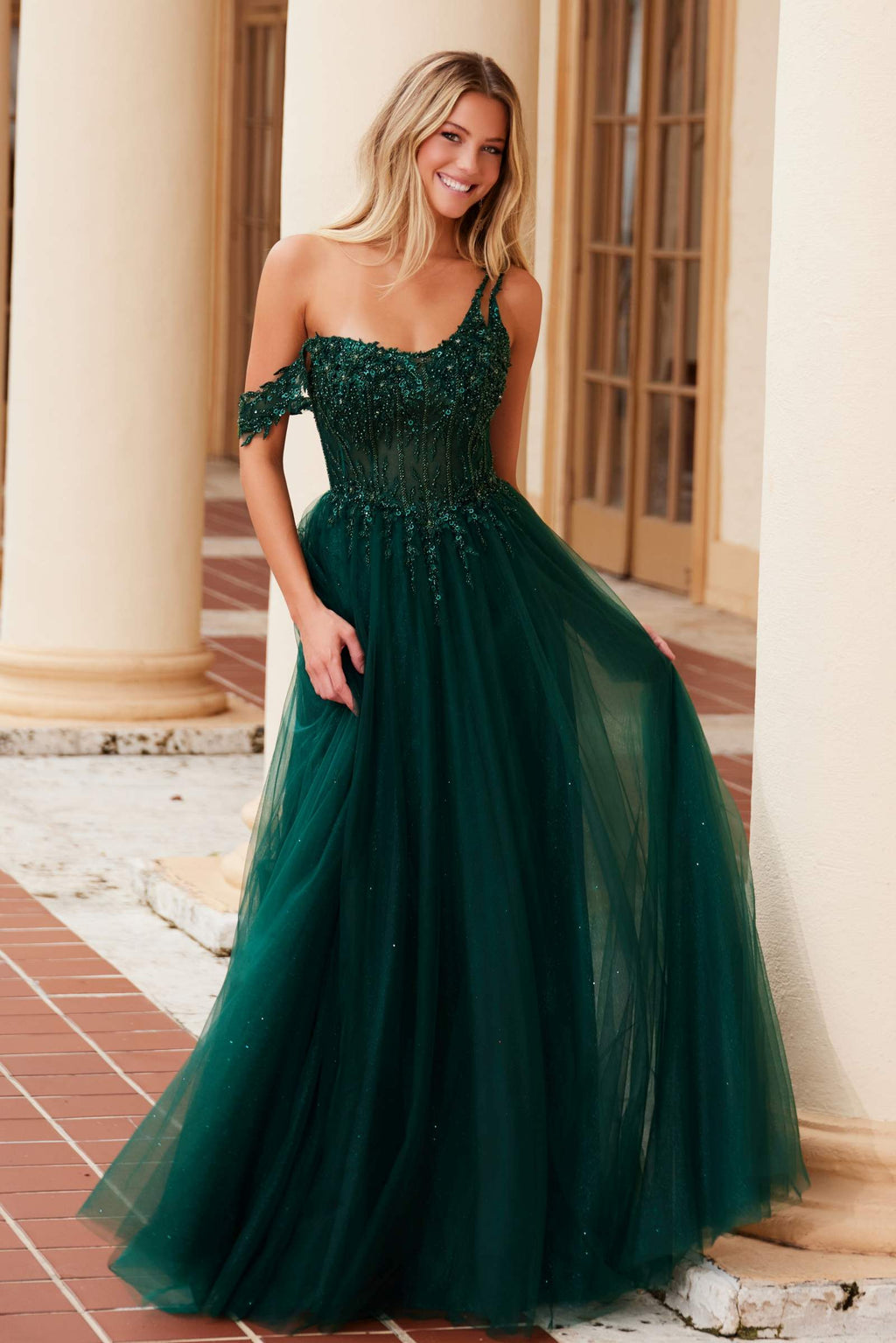 Embroidered A-line sheer dress with boned waistline, emerald green sparkle bodice, angled front