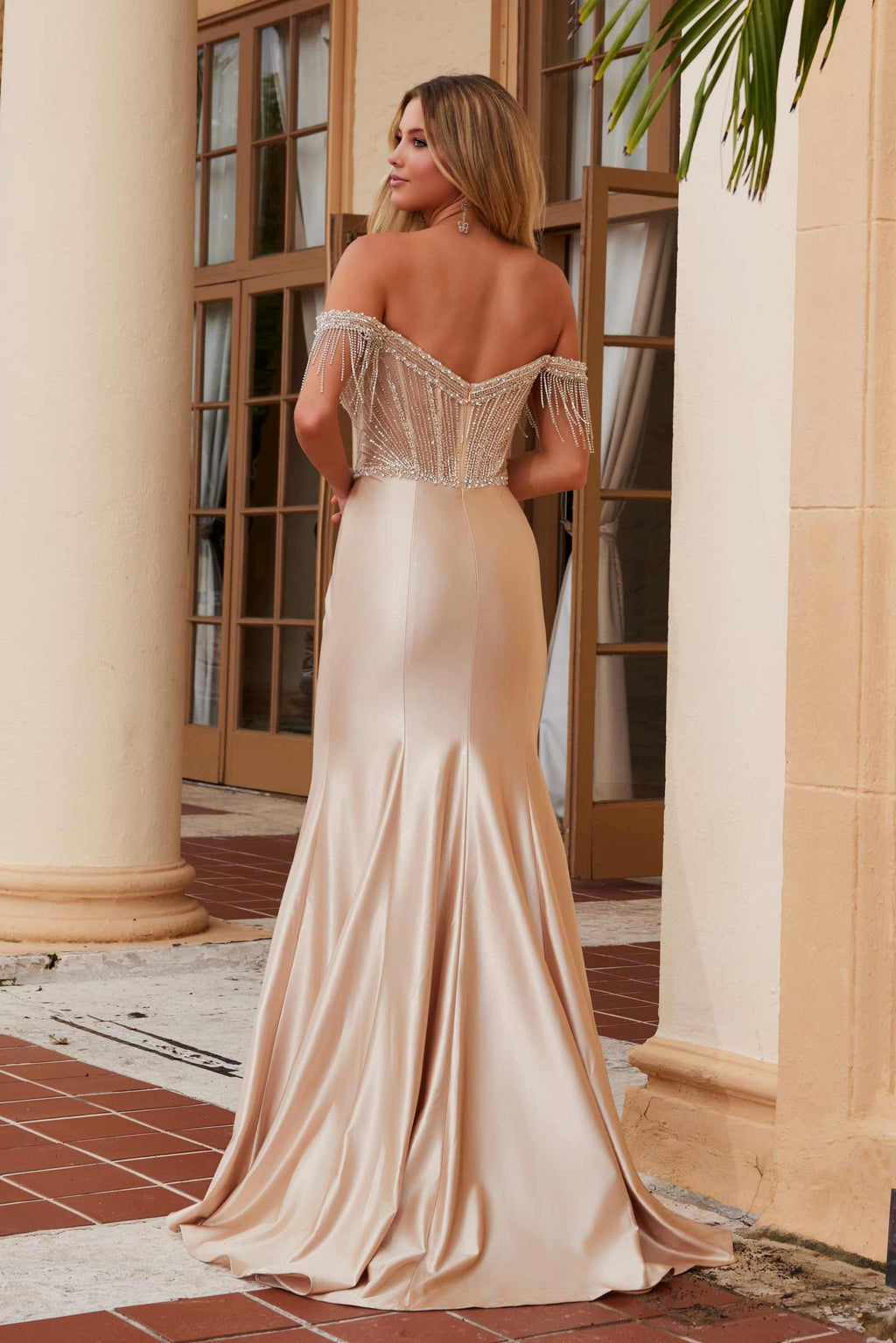 Champagne satin off-shoulder mermaid dress with beaded bodice and draped fringe straps