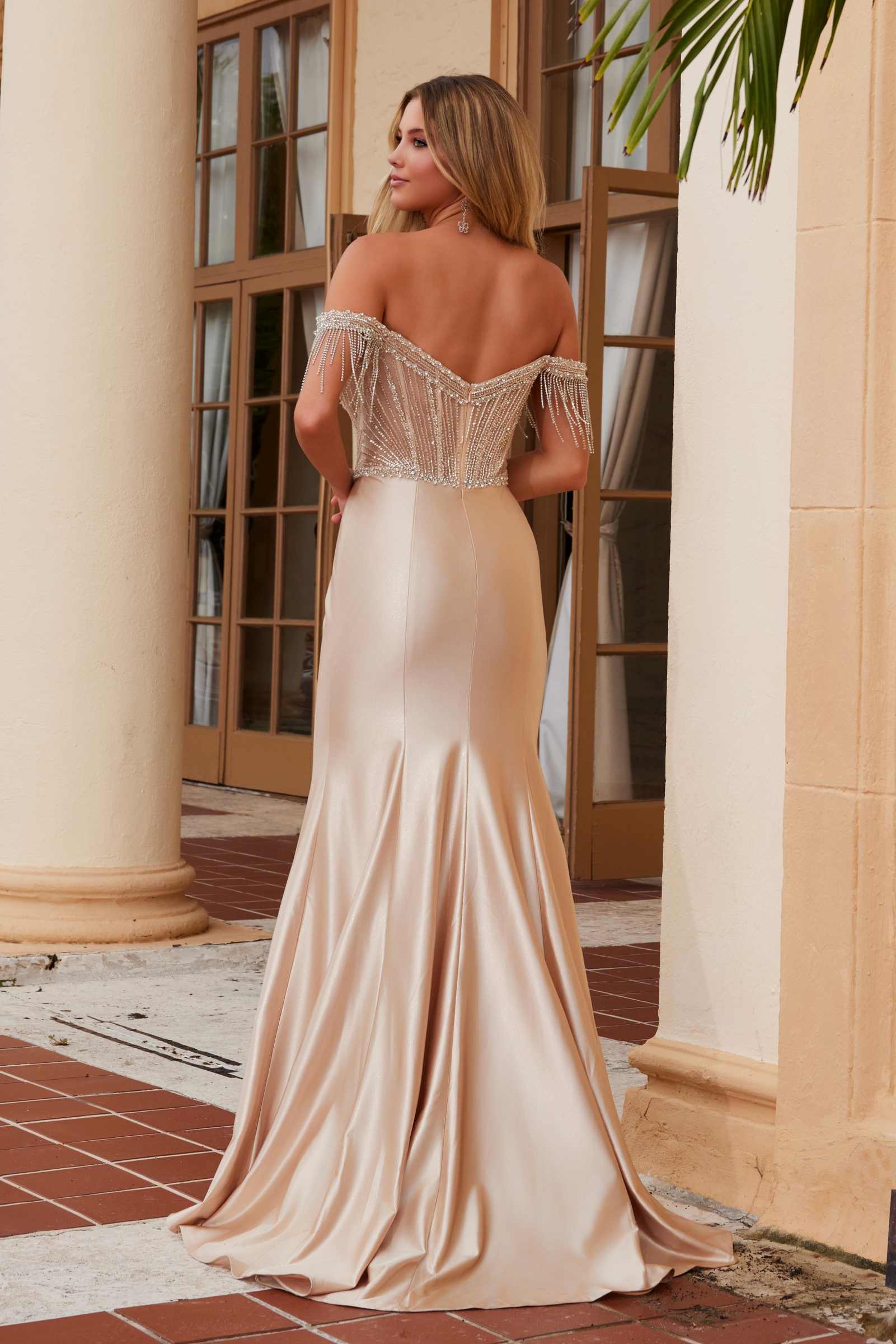 Champagne satin off-shoulder mermaid dress with beaded bodice and draped fringe straps