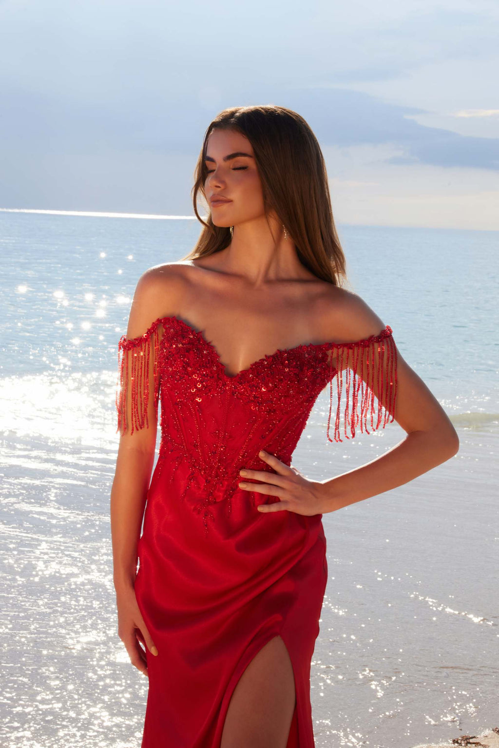 Red sequin off-shoulder sweetheart dress with fringe straps and fitted bodice
