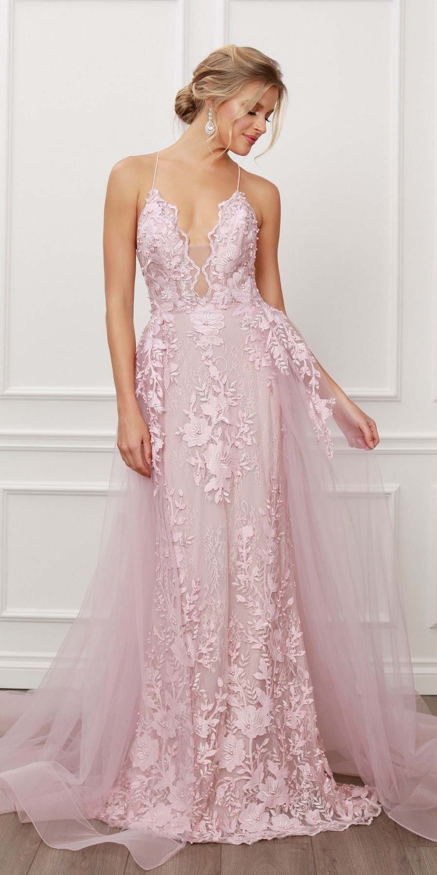 Blush mermaid lace gown with beaded appliques and sheer tulle overskirt, front view