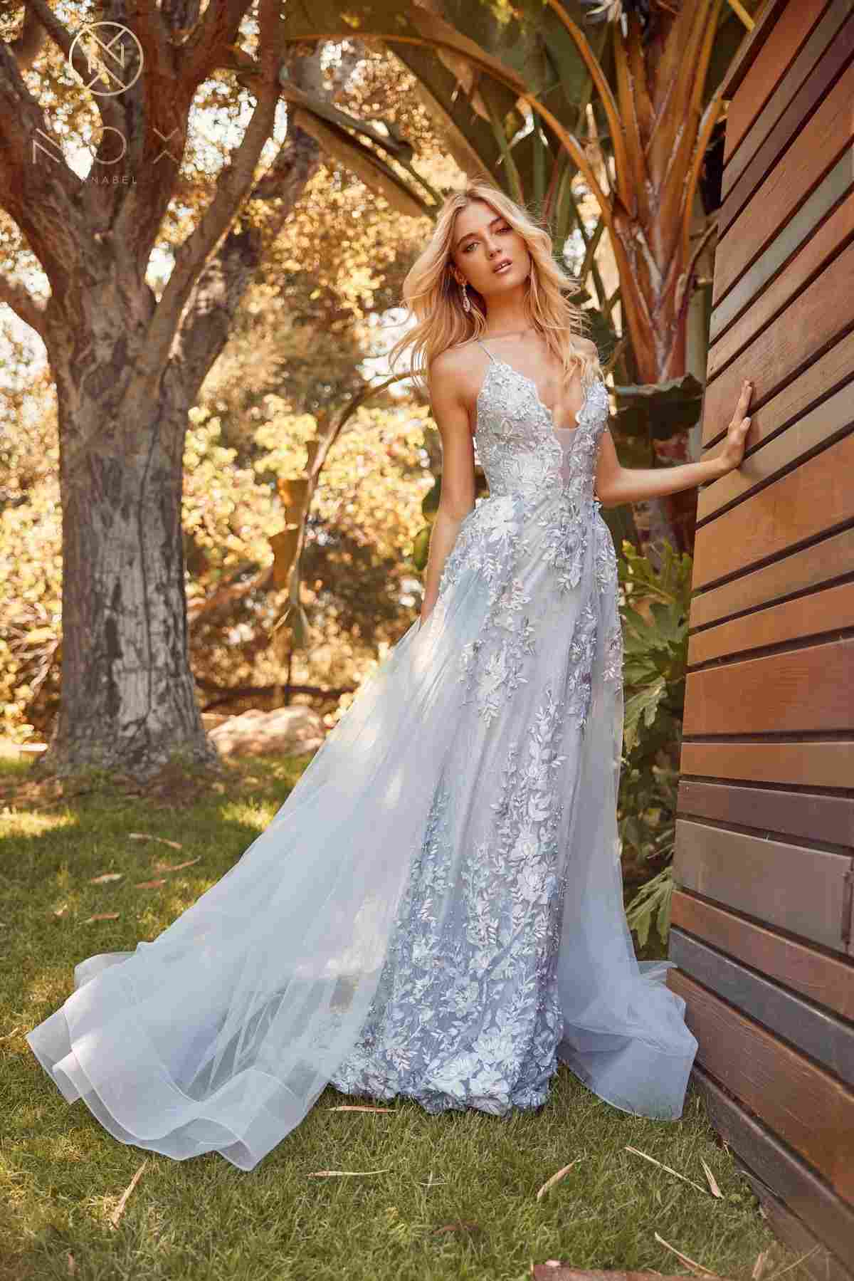 Light blue lace mermaid gown with beaded bodice and chiffon overskirt, front view