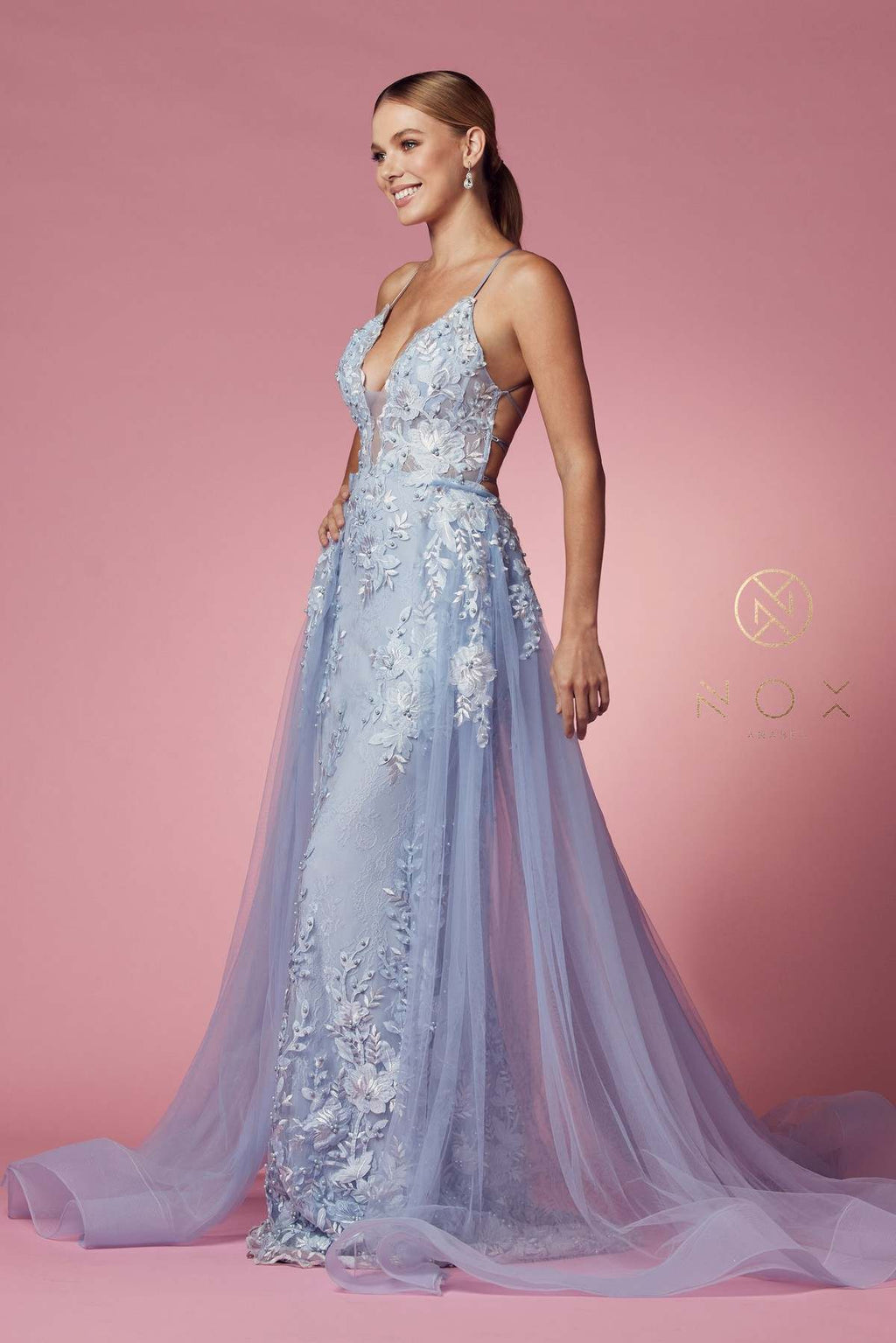 Light blue mermaid gown with lace applique and beaded V-neck, with flowing sheer skirt