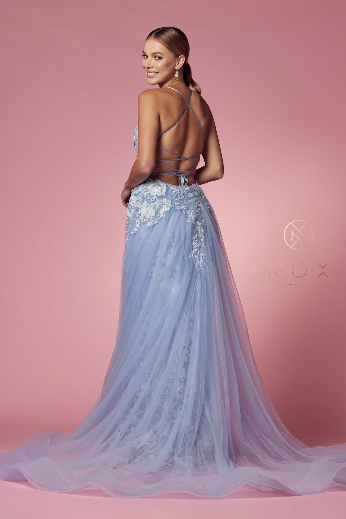 Light blue lace mermaid gown with beaded bodice, thin crisscross straps, front view