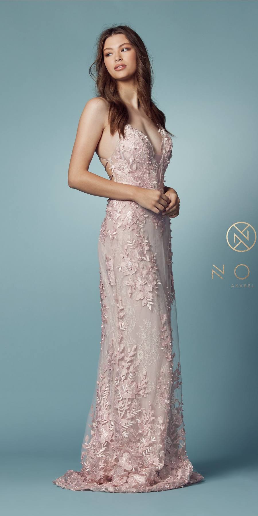 Blush lace mermaid gown with V-neck straps and fitted silhouette with trailing hem