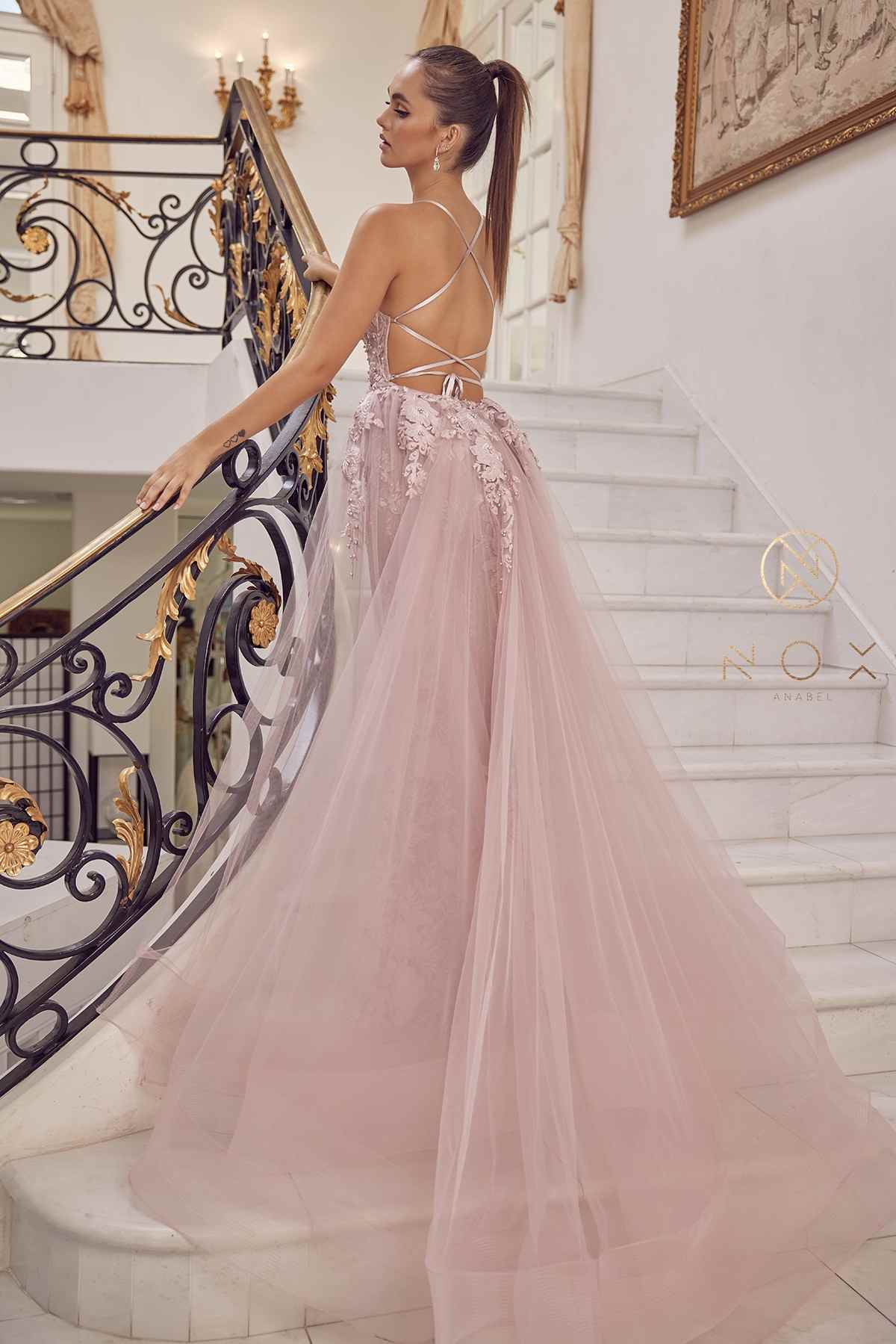 Blush mermaid lace gown with beaded details and sheer tulle overskirt, side view