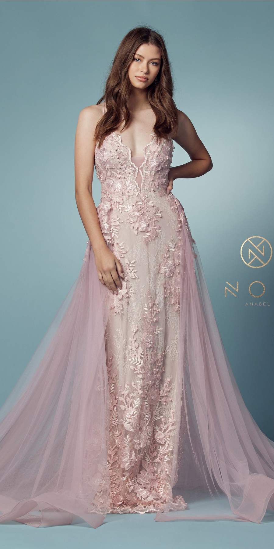 Blush mermaid lace gown with beaded bodice and sheer tulle overskirt, front view