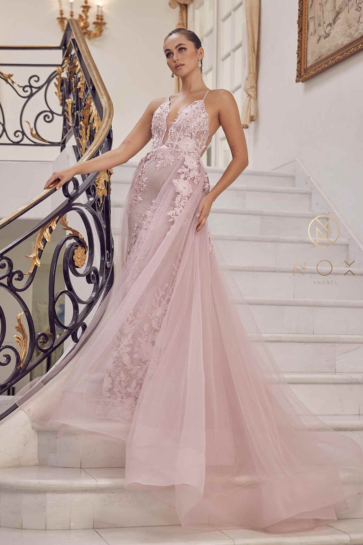 Blush mermaid lace gown with beaded applique and sheer tulle overskirt, full length