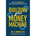 Hardcover personal finance book, dark blue cover with large yellow 'Money Machine' title.