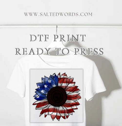 Patriotic sunflower DTF print transfer with red, white, and blue petals and dark center