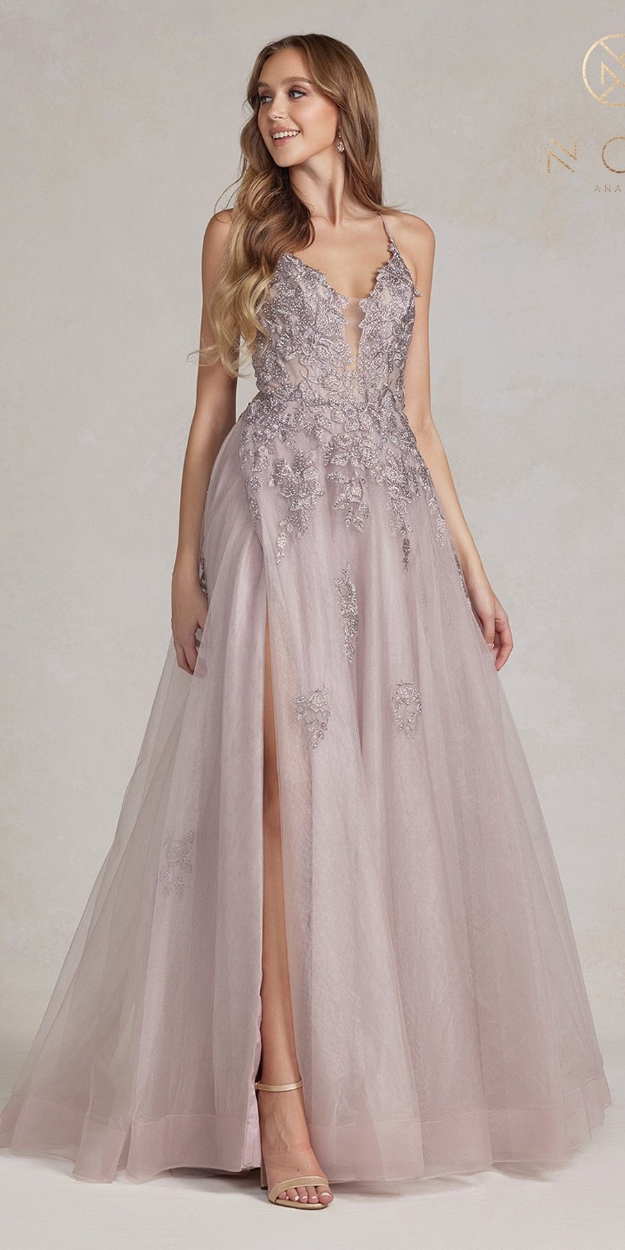 Mauve A-line tulle gown with lace appliques, spaghetti straps, front slit