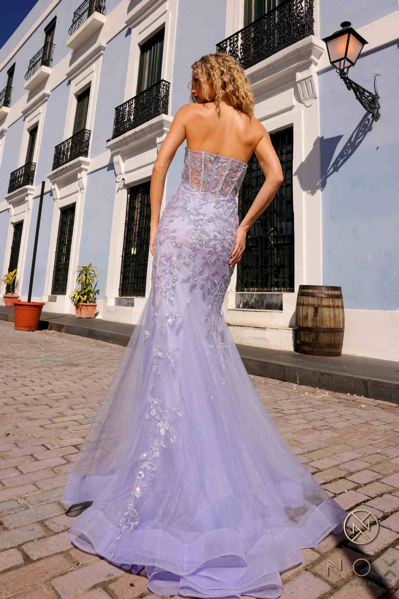 Periwinkle strapless corset lace applique mermaid gown with low back design