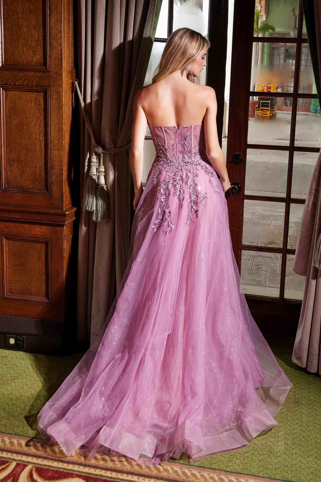 Dark rose A-line tulle dress with sequin applique, open back and flowing skirt hem