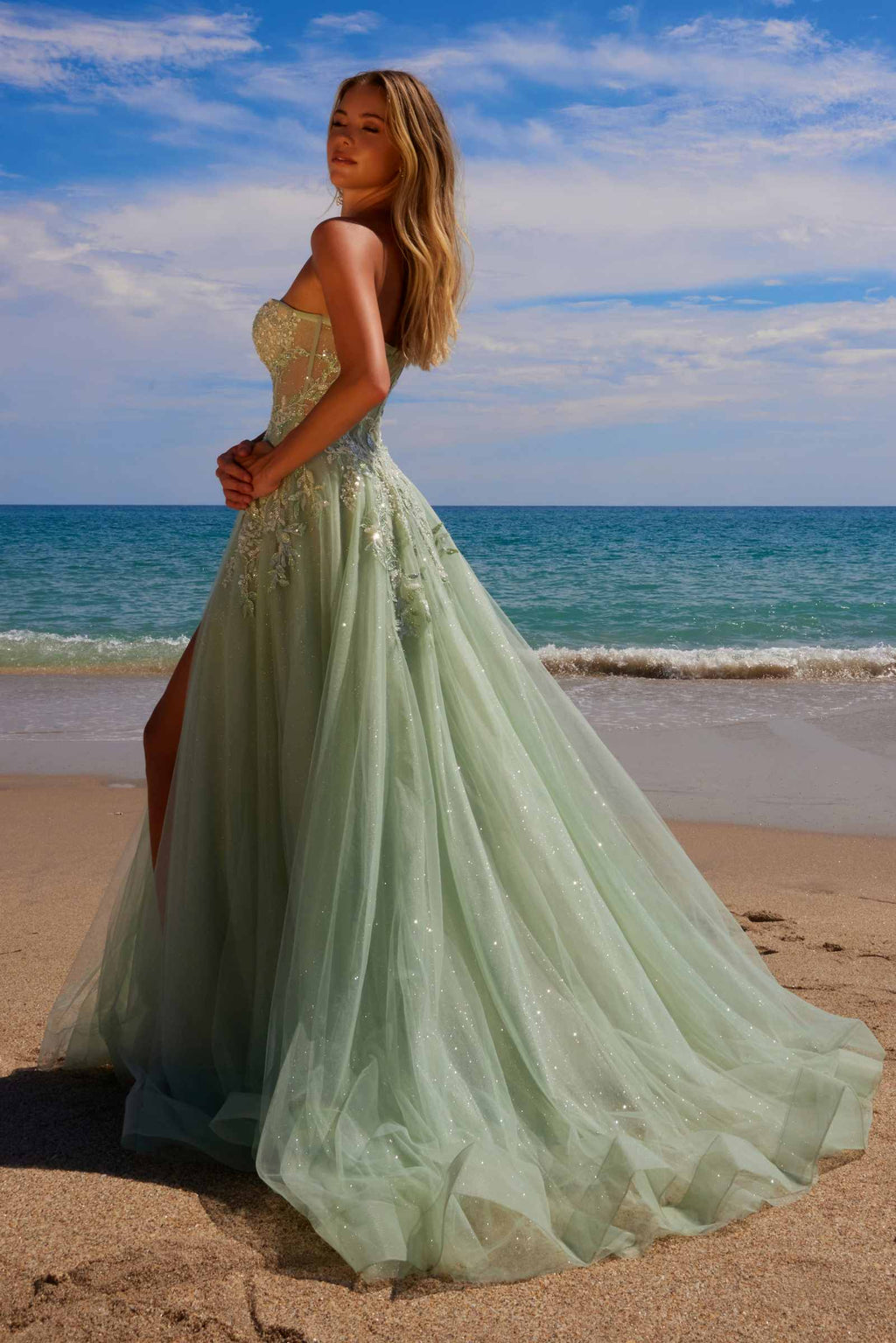 Sage green A-line tulle gown, side view, with sparkling sweetheart sequin top