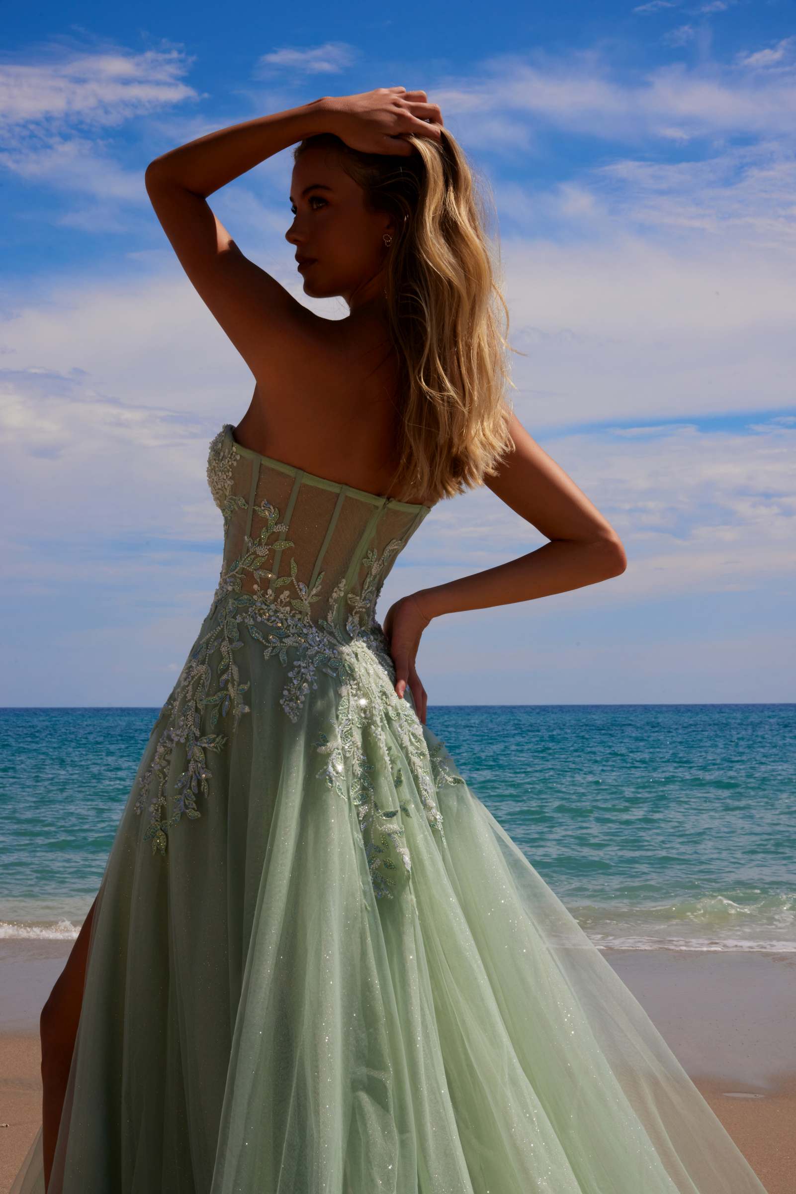 Sage green A-line tulle dress with fitted sweetheart sequin bodice and full skirt