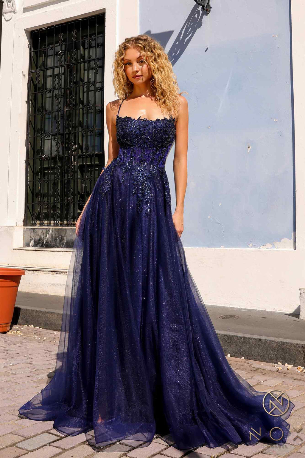 Navy glitter tulle ball gown with lace-trim bodice and full A-line skirt