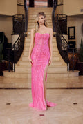 Pink strapless evening dress with embroidered bodice and side slit