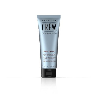 American Crew Fiber Cream tube, blue label with black base and cap, front view.