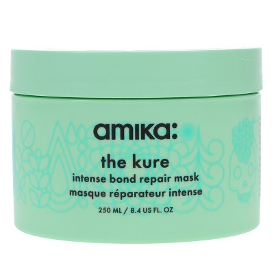 Mint green hair mask jar with amika the kure intense bond repair mask front label
