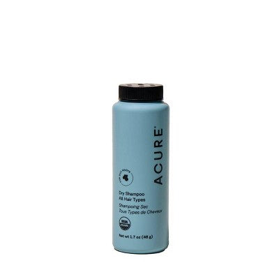 Acure dry shampoo bottle with blue label and black cap
