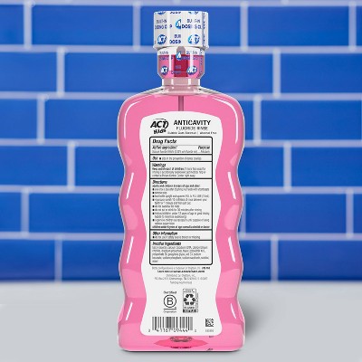 Kids bubble gum anticavity fluoride mouthwash bottle, pink back label with barcode