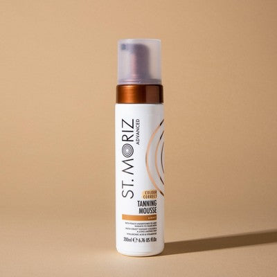 St. Moriz tanning mousse bottle with silver cap and brown pump, light shade